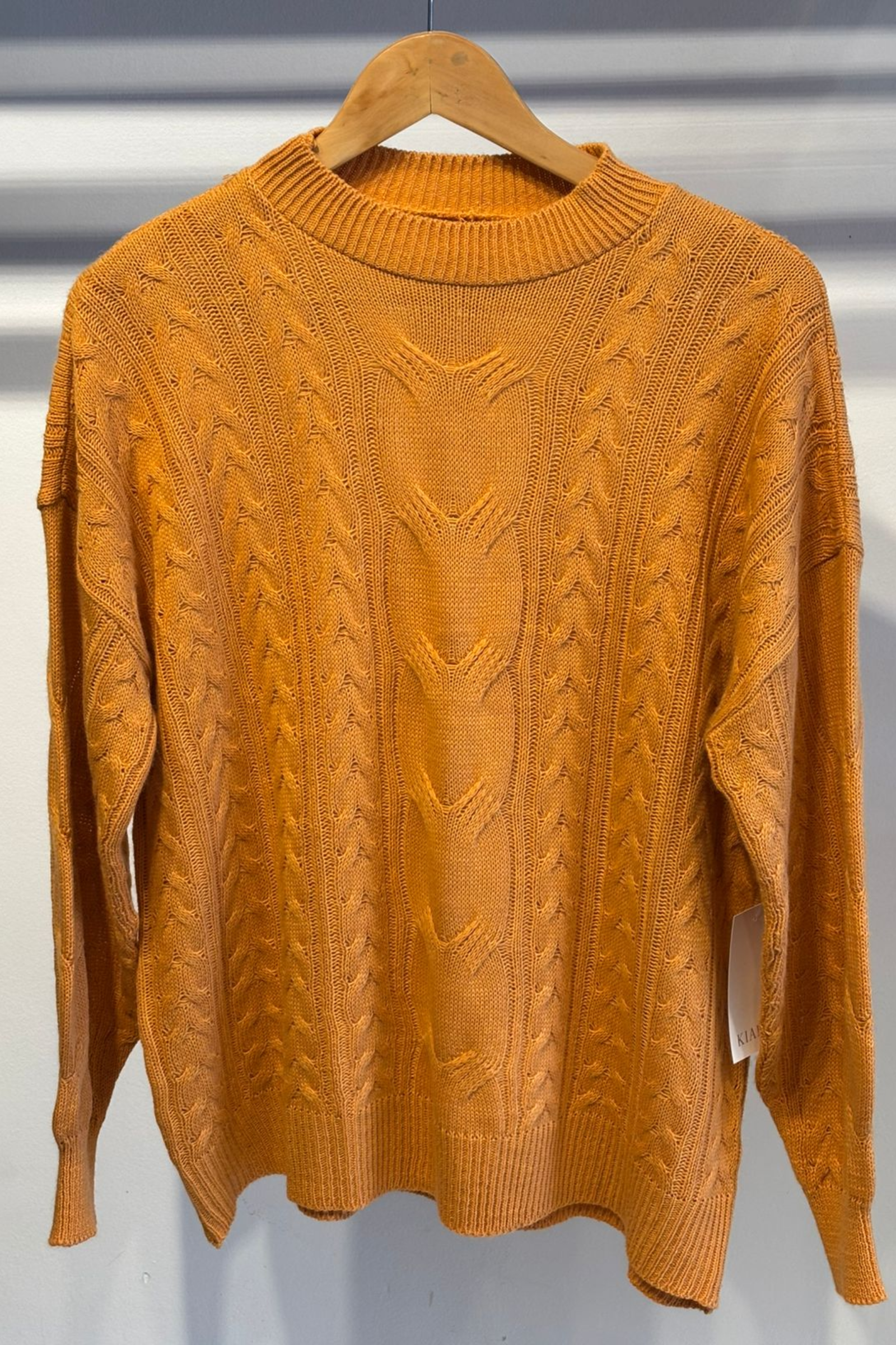 SWEATER CON TRENZAS Y OCHO CENTRAL OVER - Imagen 2