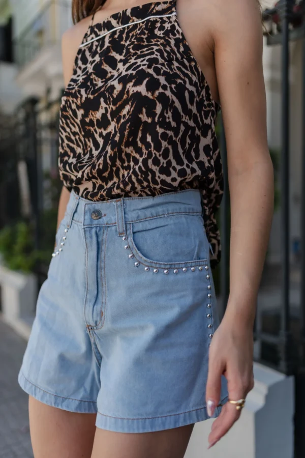 SHORT DE JEANS CON TACHAS - Imagen 4